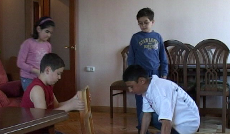 How is the program on foster families put into practice in Armenia?