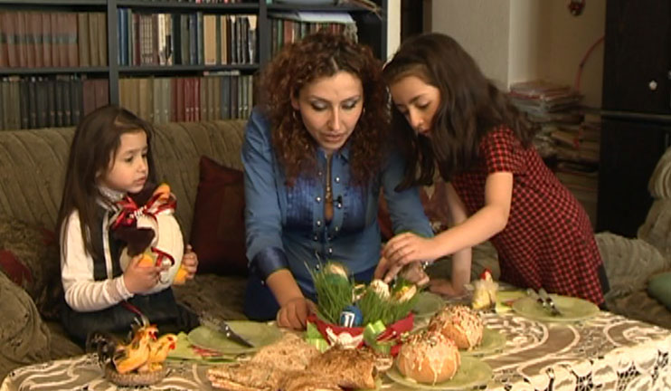 Armenian family preparing traditional Easter table