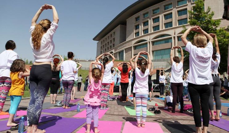 Open-air yoga class at Tumo Park