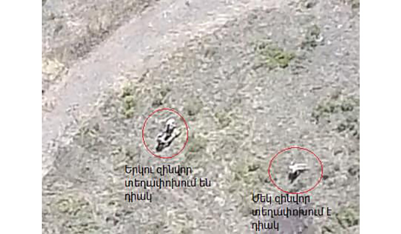 Azerbaijanis evacuate corpses of their servicemen