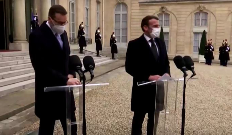 Macron says supports EU Commission on vaccine orders