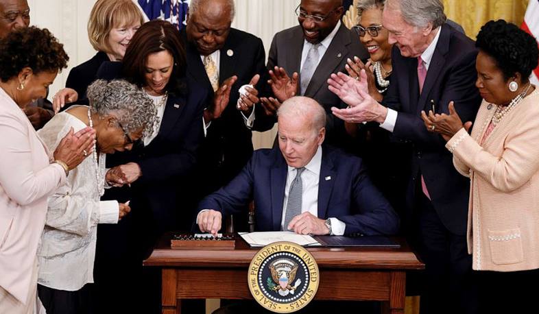 Biden signs bill making Juneteenth, marking the end of slavery, a federal holiday