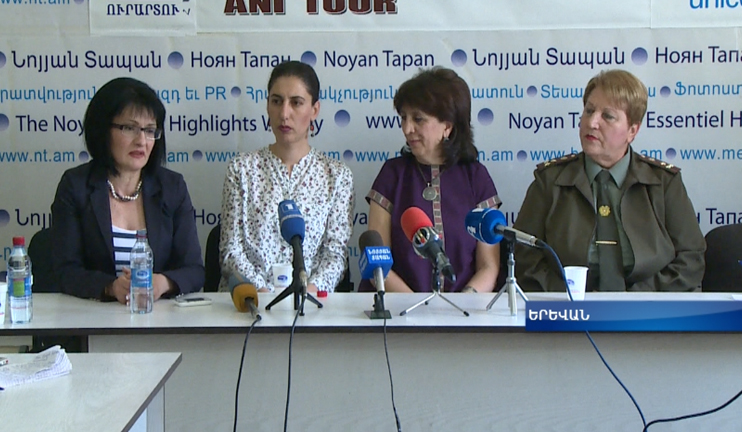 Armenian women stand by the army