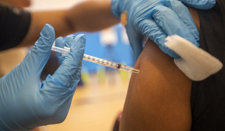 U.S. reaches 70% Covid vaccine milestone for adults about a month behind Biden’s goal