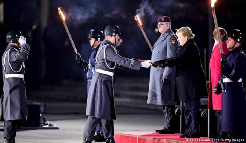 Outgoing German Chancellor Angela Merkel receives farewell military honors at 'Grand Tattoo'