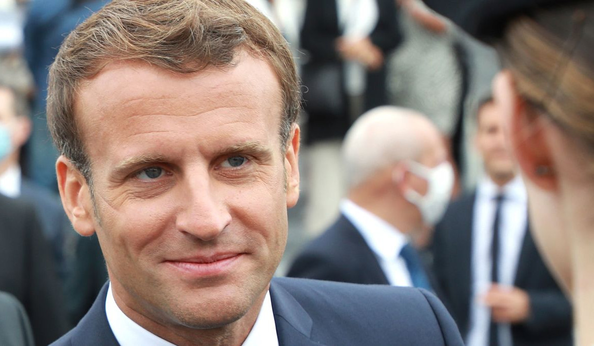 Macron defends his record without formally declaring run for presidency