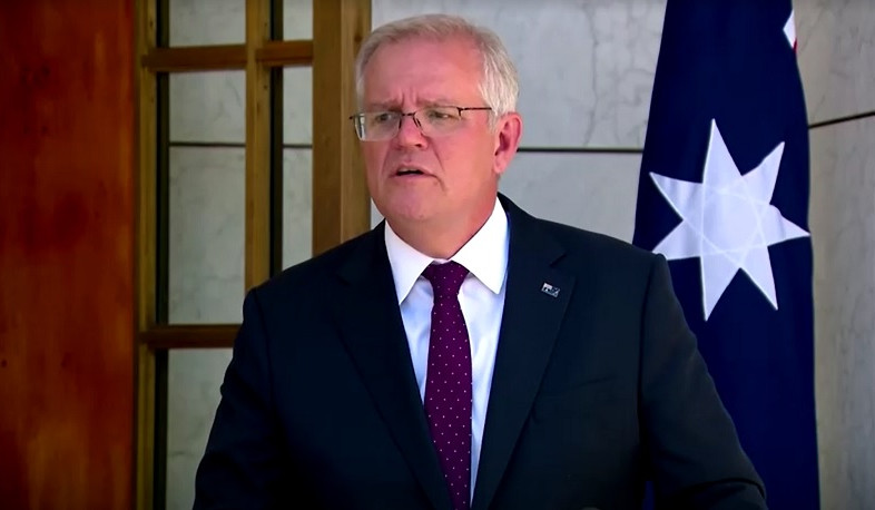 Australia relaxes testing rules amid Omicron surge