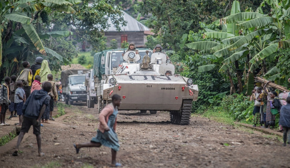 Militia kills at least 60 people at shelter in Congo