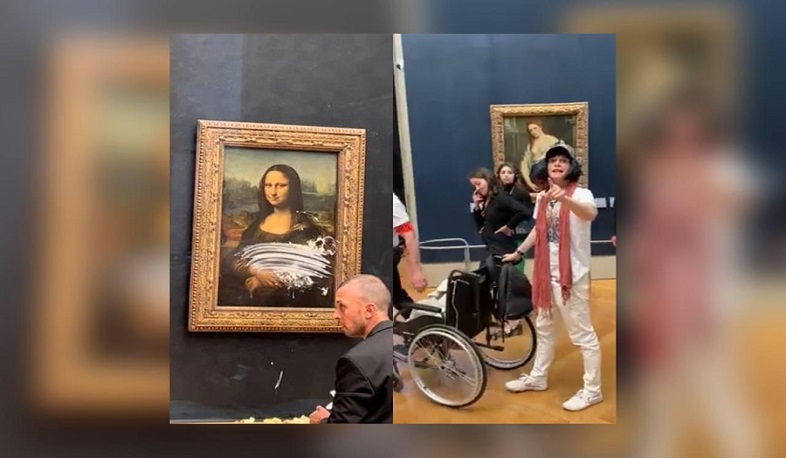 Mona Lisa attacked with cake by disguised eco-activist