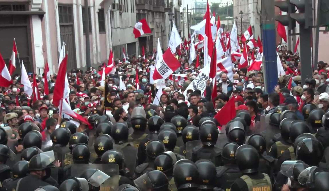Anti-government Peruvian protesters clash with police in Lima