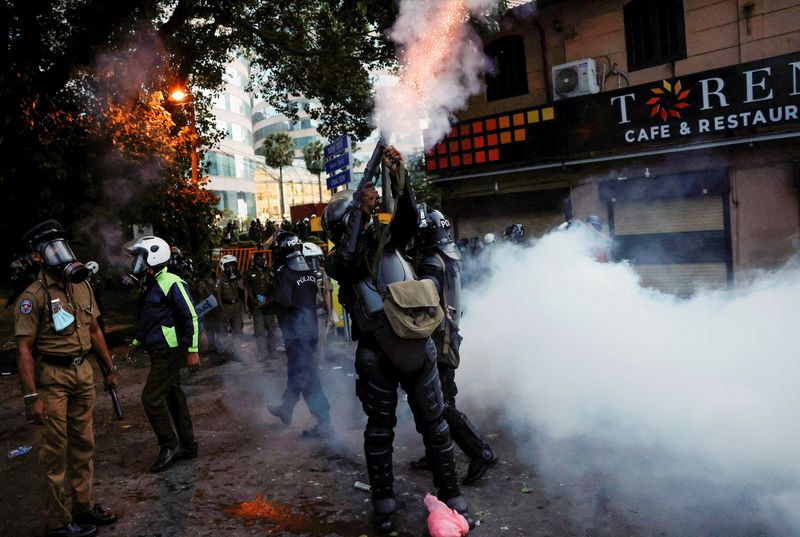Sri Lankan police fire tear gas as protesters descend upon PM's office