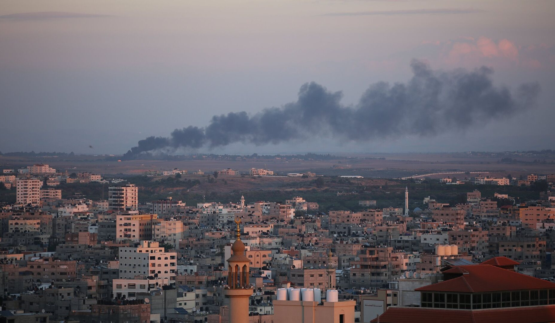Israeli artillery fire into Gaza as fighting spills into second day