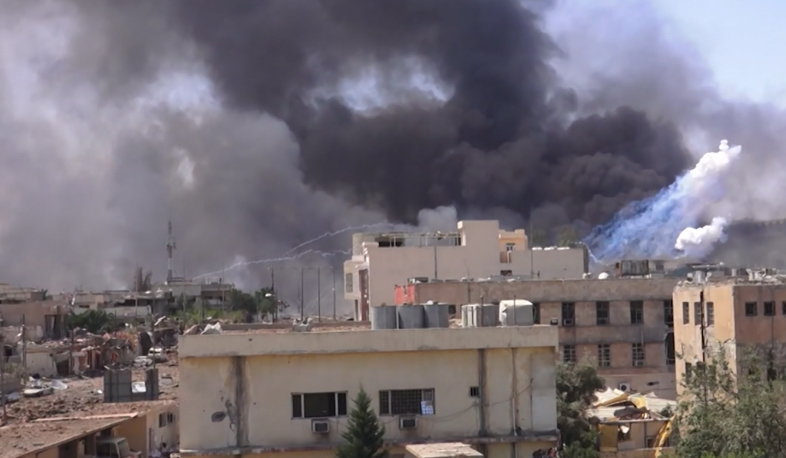 US warplanes bomb Syrian regions of Raqqa and Deir ez-Zor