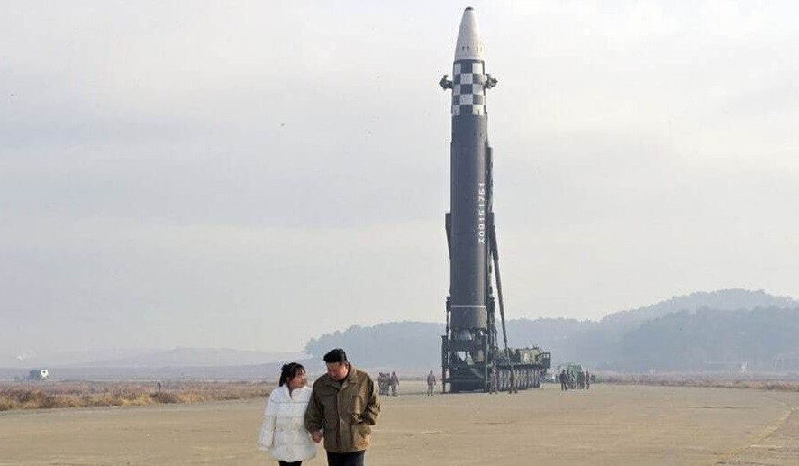 North Korea’s Kim presents missile, daughter in a bid to strengthen leadership