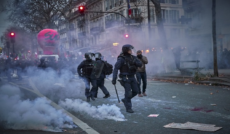 Pension reform protesters take to Paris streets as turnout dips