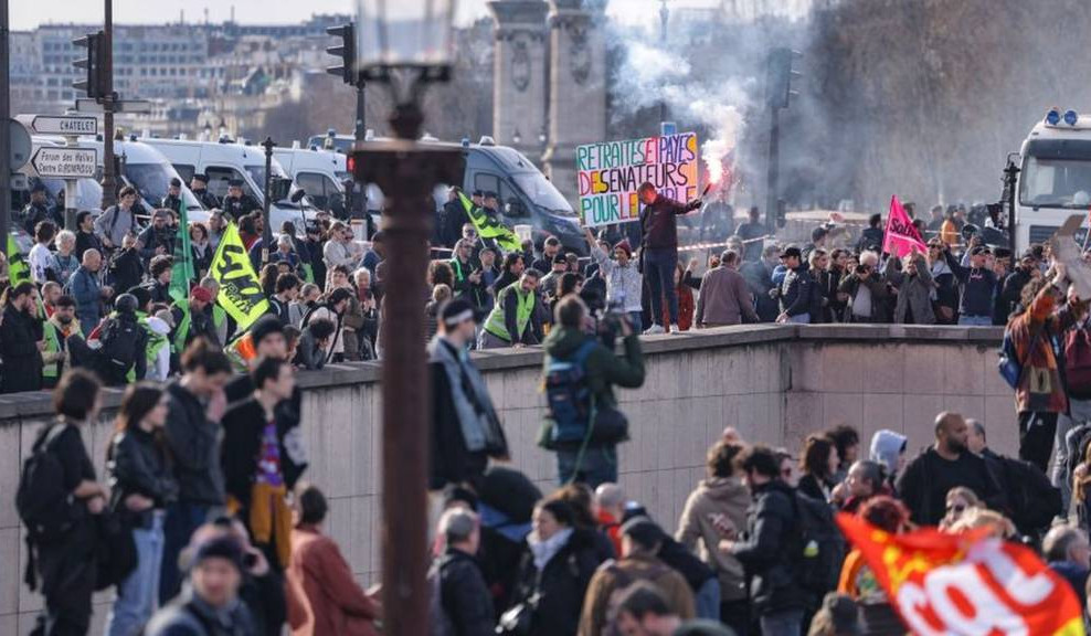 Fire and rage on Paris streets after pension change pushed through