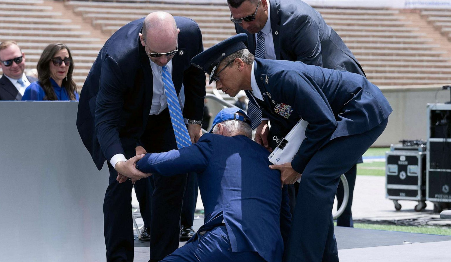 Biden trips and falls during graduation ceremony, recovers quickly