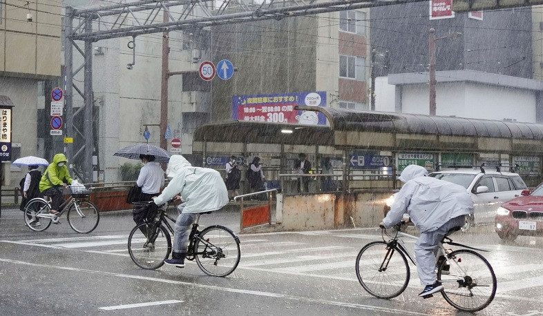 Torrential rain in central Japan causes river to overflow