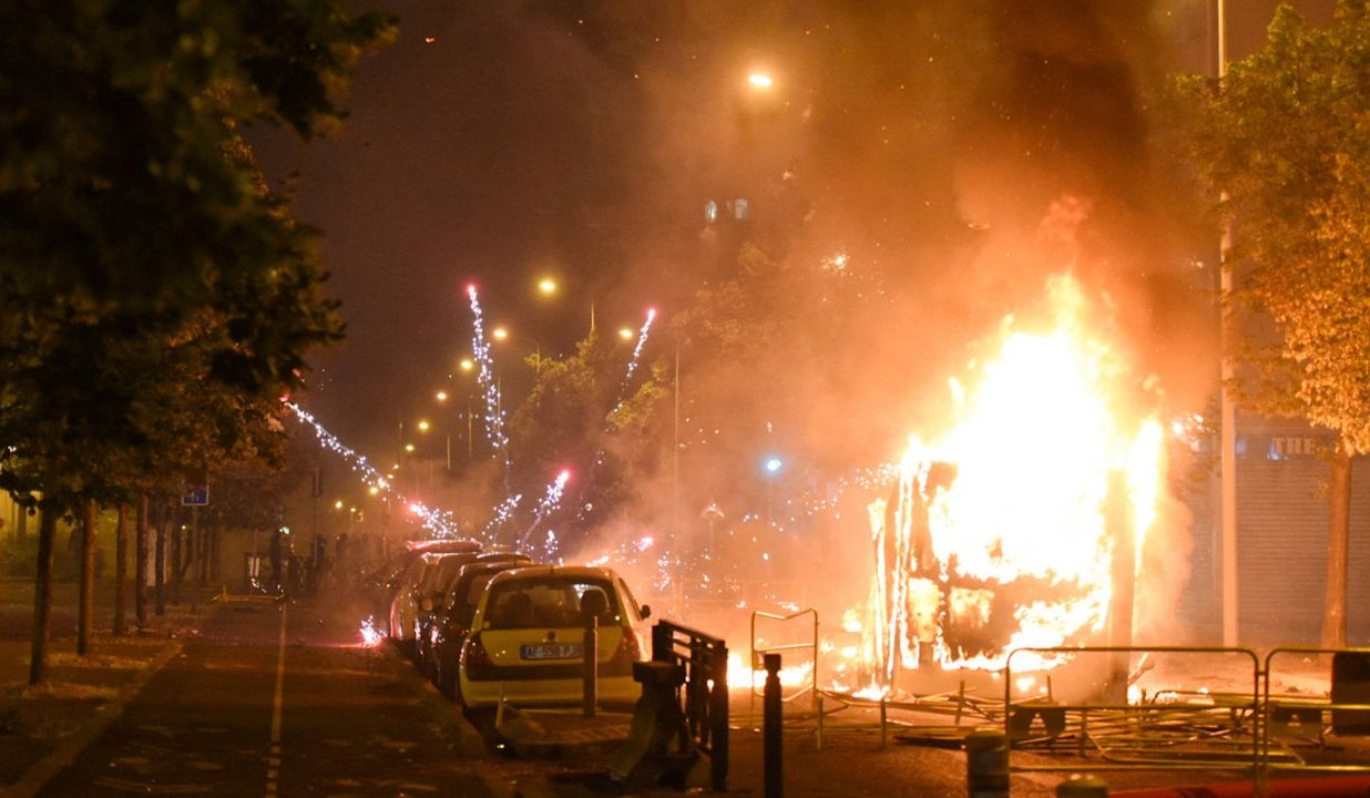 Fires burn as protests flare in Paris after police shoots dead teen in traffic stop