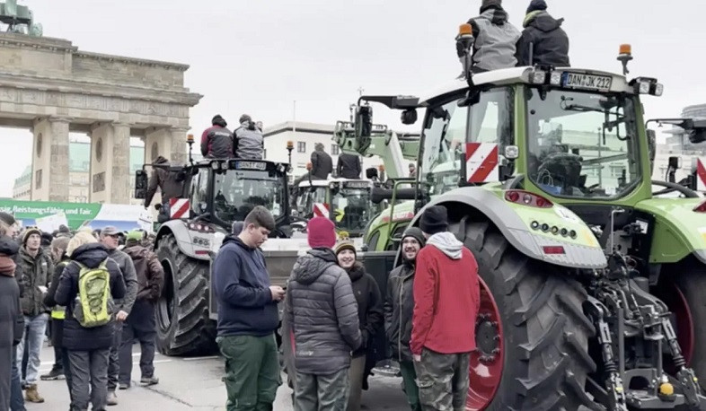 German farmers block roads with tractors in protest at subsidy cuts
