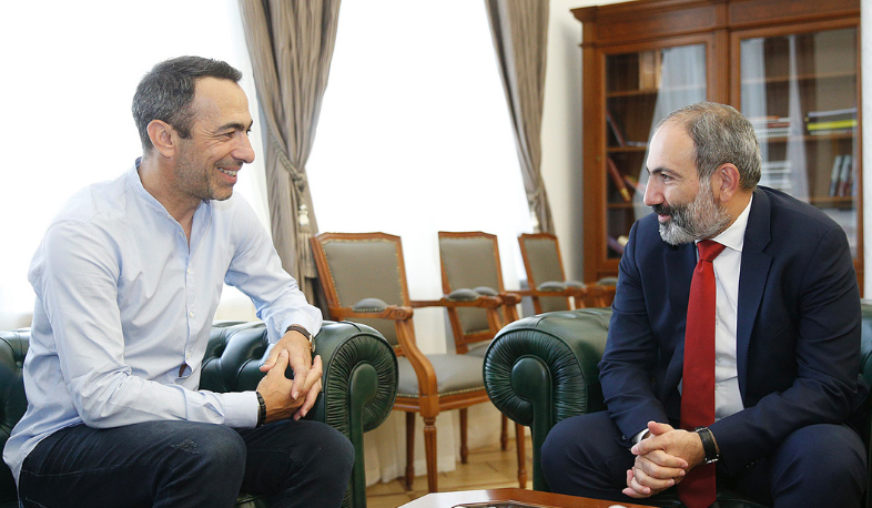PM receives Yuri Djorkaeff