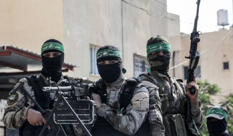 Hamas official says group would lay down its weapons if a two-state solution is implemented, AP