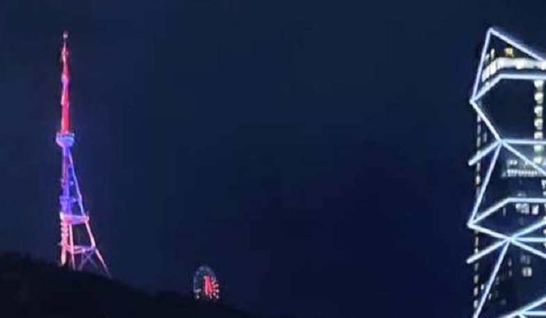 Tbilisi TV tower illuminated with colors of Armenia's flag