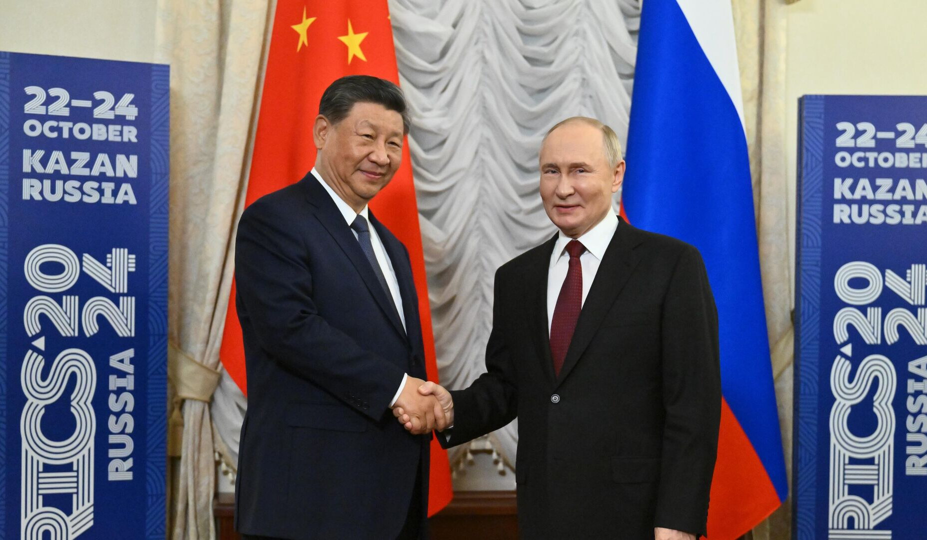 Putin praises China-Russia relations as a model during a meeting with President Xi