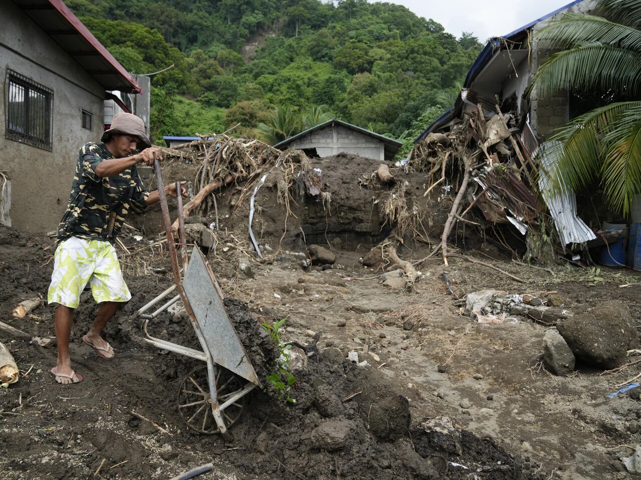 At least 126 dead or missing in massive flooding and landslides in ...