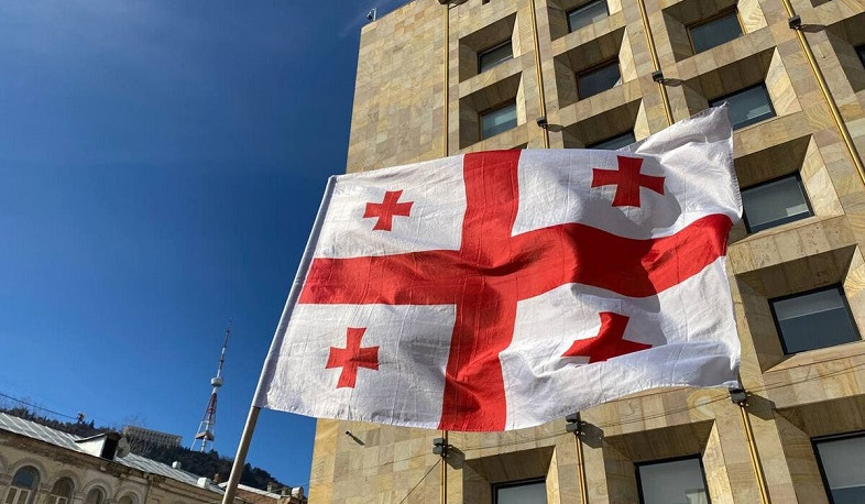 Georgian parliament bans face masks and fireworks at protests