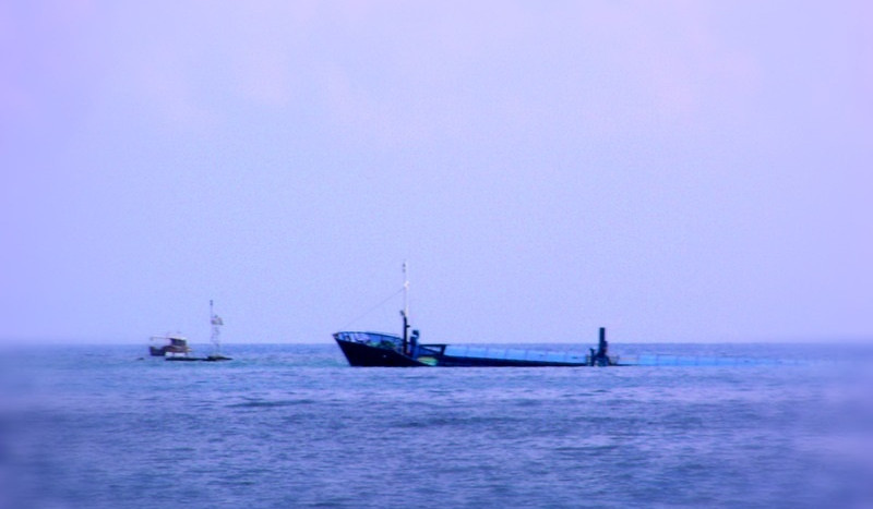 Rescuers retrieve body from water after ferry sinks off Indonesia's Bali coast