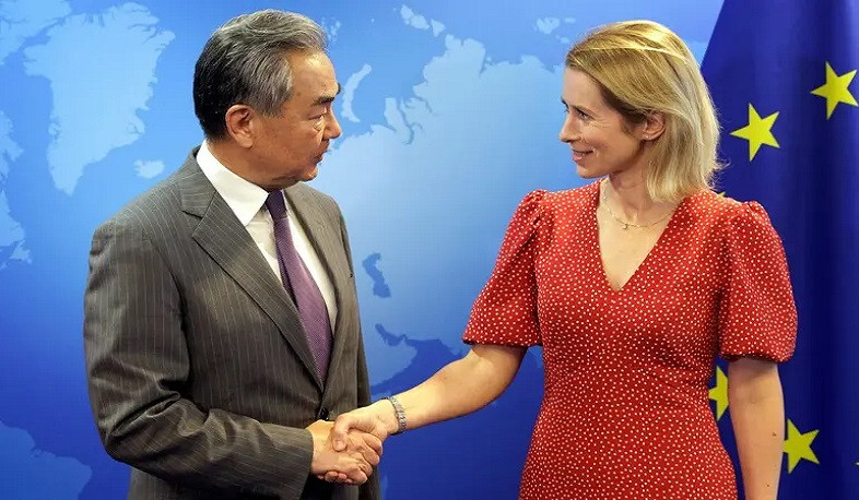 Китай и Европейский союз должны совместно решать глобальные проблемы: Ван И