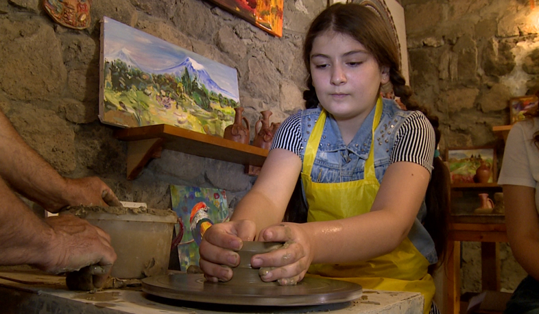 Albert Parsamyan gives pottery lessons