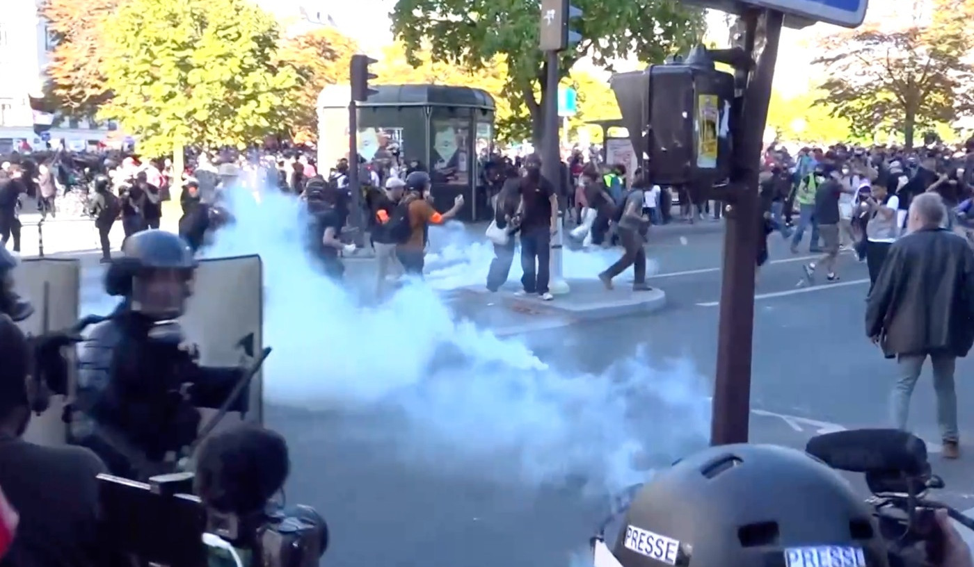 Tense moments in union-led Paris protest, as police use tear gas