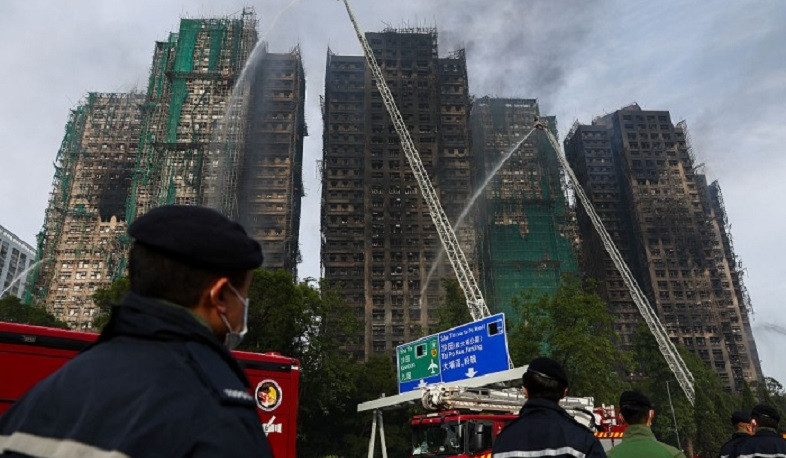 Death toll in Hong Kong apartment building fire exceeds 100