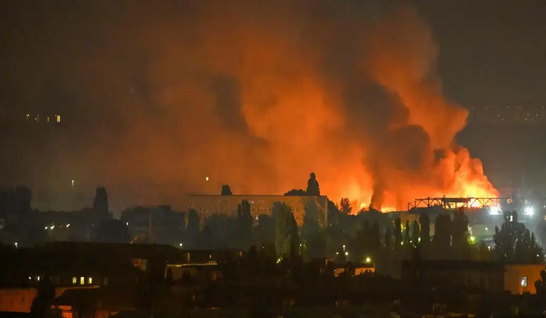Firefighters battle fires inside warehouse in Kyiv after deadly Russian attack